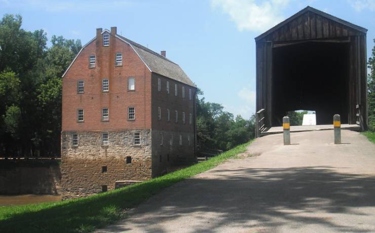 The mill from behind and the covered bridge