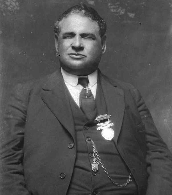 In this later cropped II photograph of Blind Boone he is wearing a medal given to him by John and Ruth Lange on his birthiday in 1887 Louise B. Trigg Photograph Collection P0163-07 SHSM.jpg