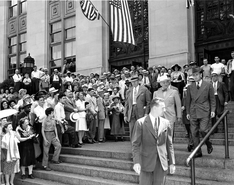 Harry Truman leaving the Federal courthouse on Grand to attend the 50th anniversary celebration of the Kansas City University School of Law.